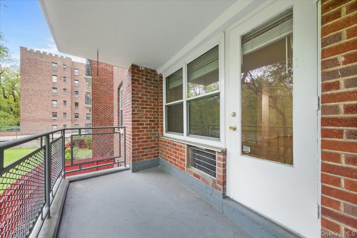 281 Garth Road, Unit C2H Scarsdale, NY 10583 - Photo 32 of 38 a view of front door with outdoor space