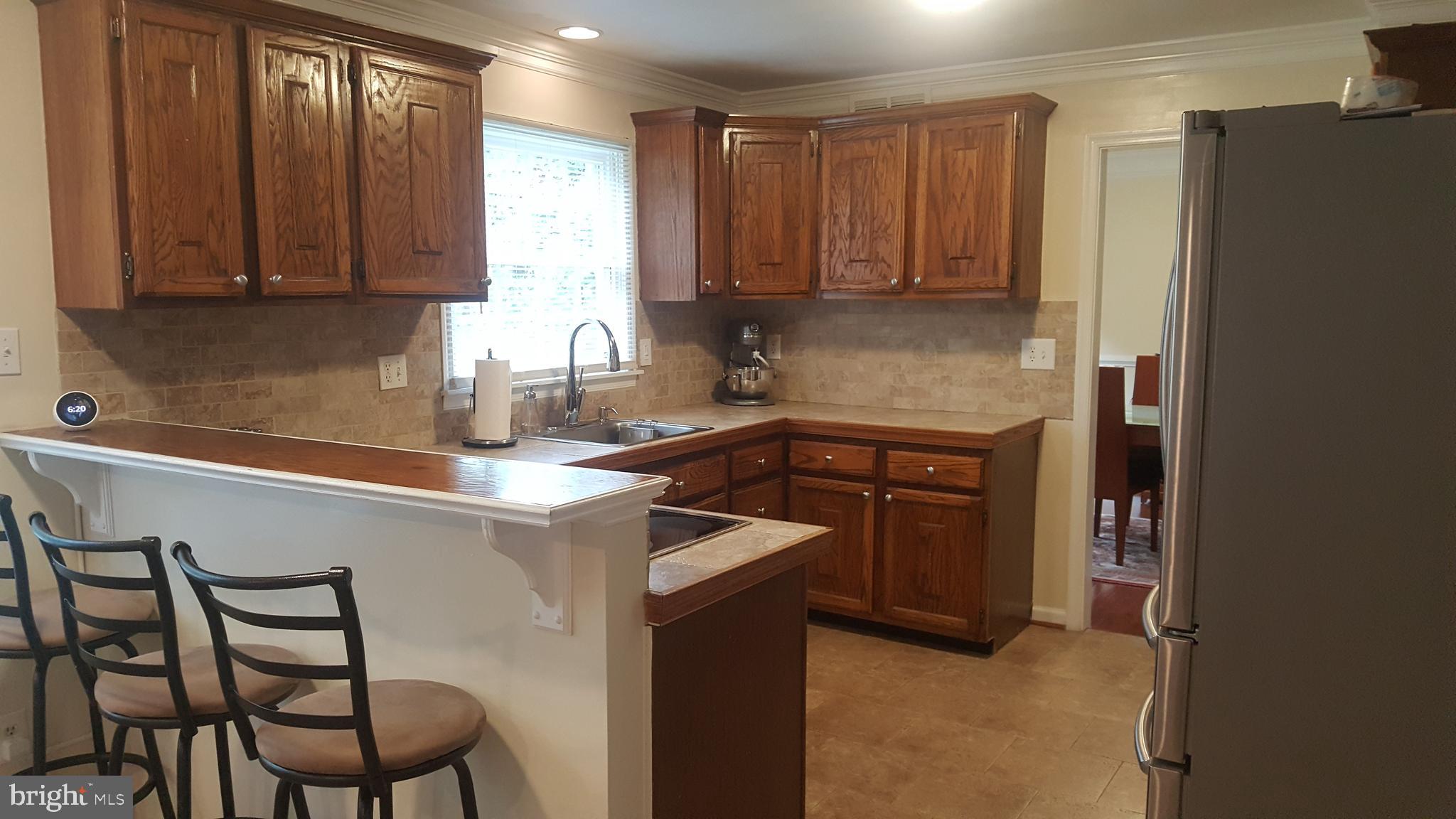 622 Cannon Road Silver Spring, MD 20904 - Photo 9 of 31 Kitchen view with raised counter top