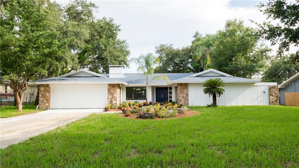 1660 Curlew Road Dunedin, FL 34698 - Photo 1 of 1 Exterior Front