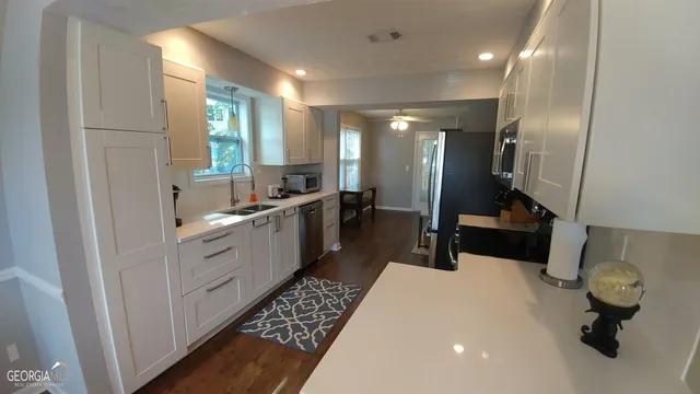 a kitchen with counter top space
