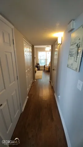 a view of a hallway with windows