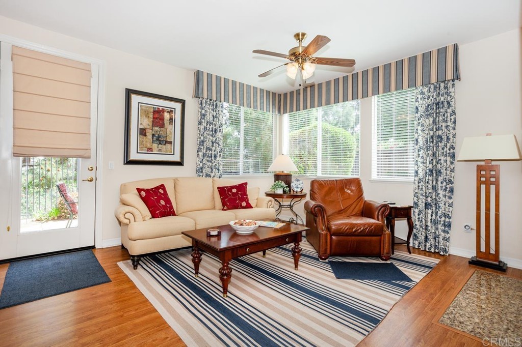 5560 Foxtail Loop Carlsbad, CA 92010 - Photo 9 of 32 a living room with furniture and a large window