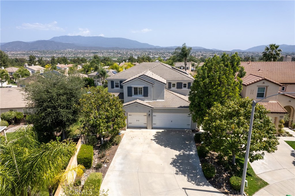 32985 Novara Court Temecula, CA 92592 - Photo 45 of 56 Aerial Front View With Extended Driveway And Mountain Backdrop
