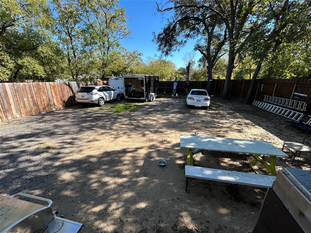 3702 Frank Street Dallas, TX 75210 - Photo 8 of 8 a view of backyard with outdoor seating