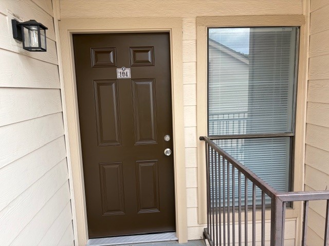 2277 South Kirkwood Road, Unit 104 Houston, TX 77077 - Photo 11 of 12 Front Door with Balcony