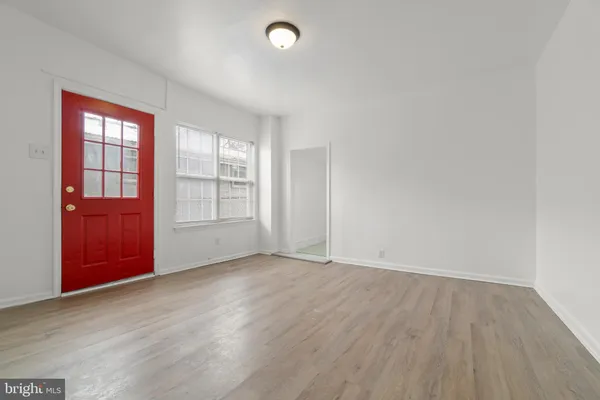 an empty room with windows