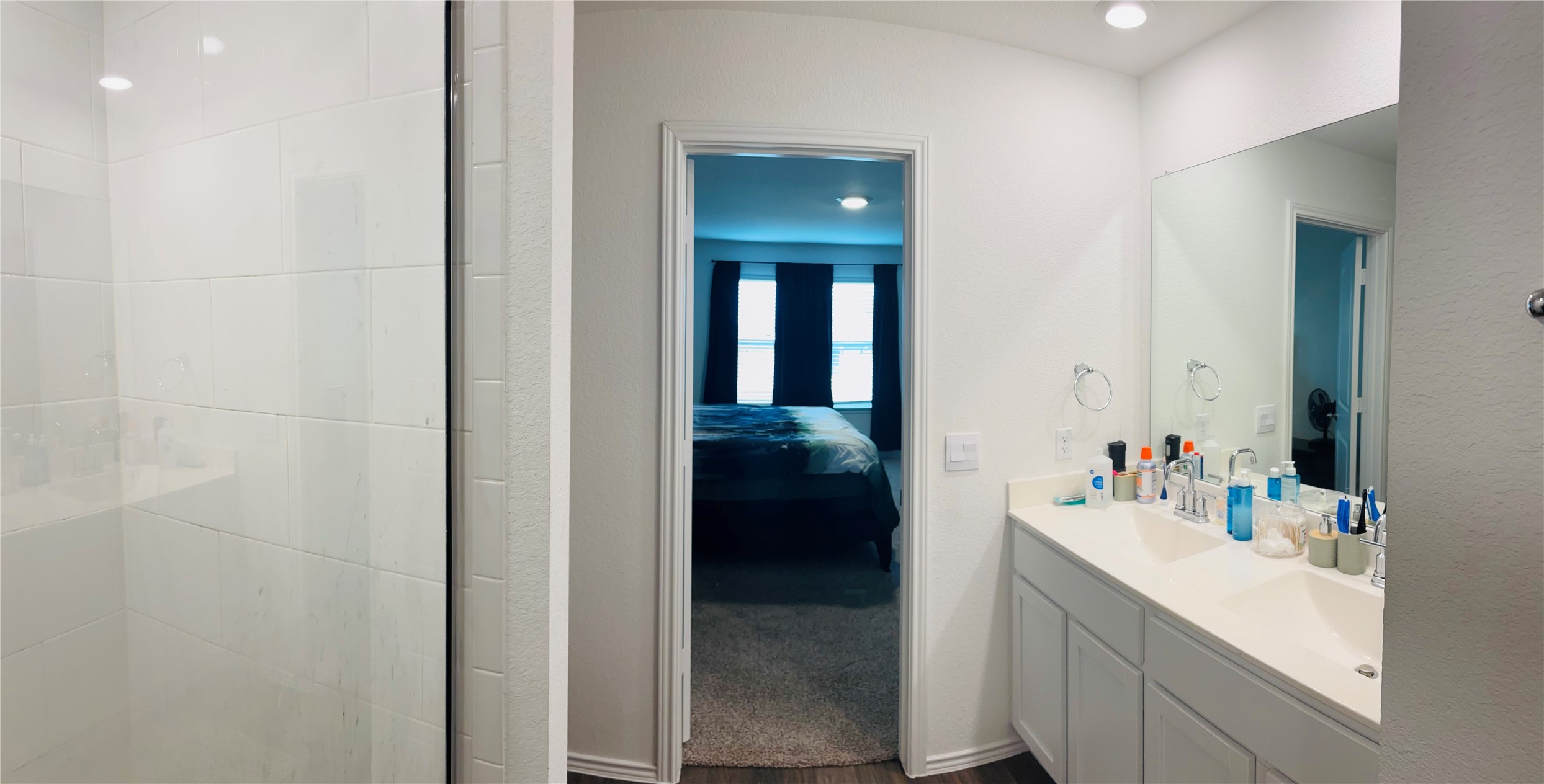 14817 Perlino Way, Unit A Manor, TX 78653 - Photo 24 of 40 a en suite bathroom with a sink and mirror