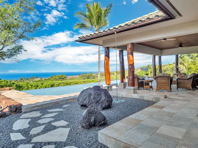a room with lots of windows and outdoor seating