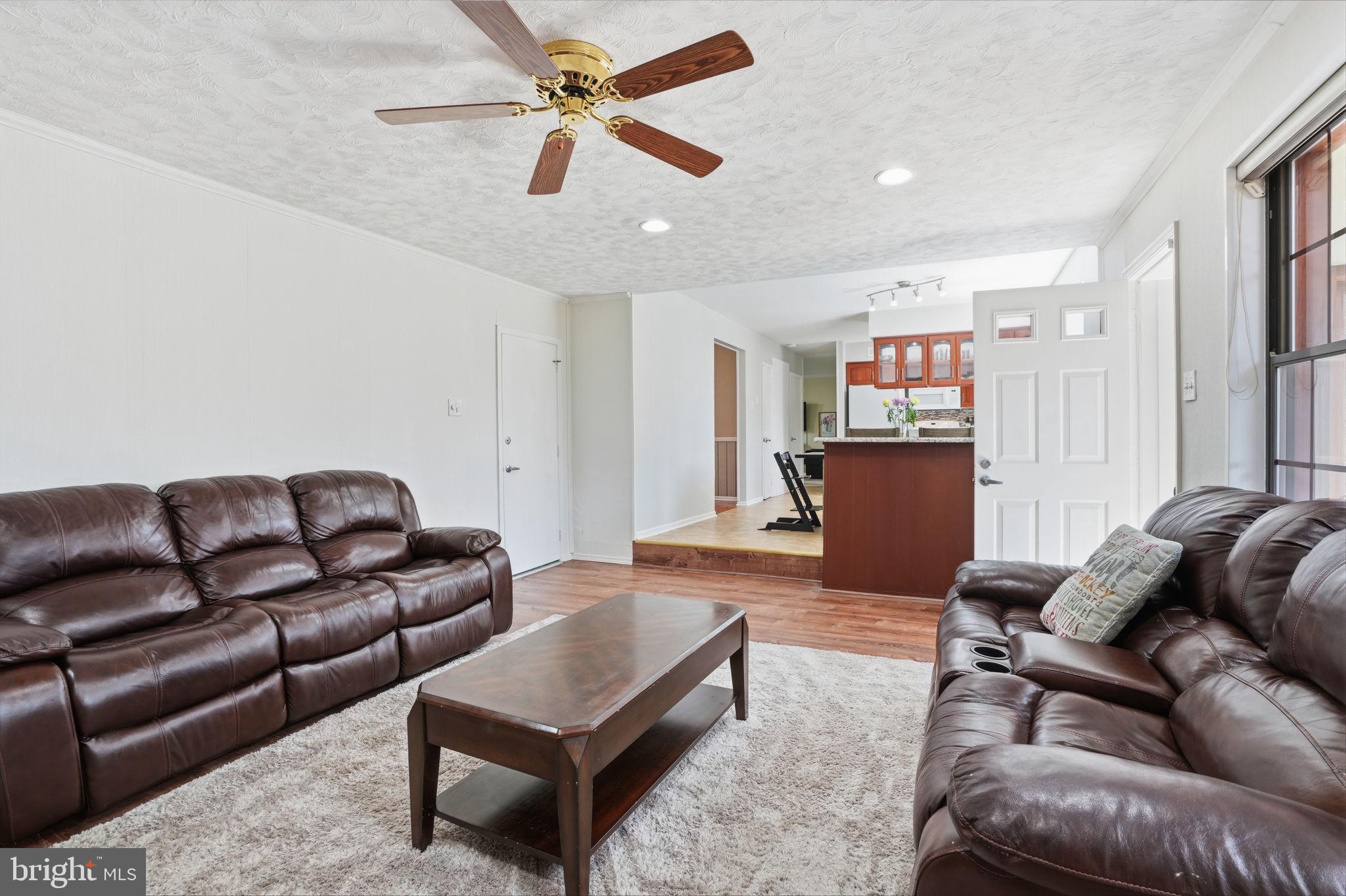 739 Bridgeview Road Feasterville-Trevose, PA 19053 - Photo 16 of 46 a living room with furniture and a wooden floor
