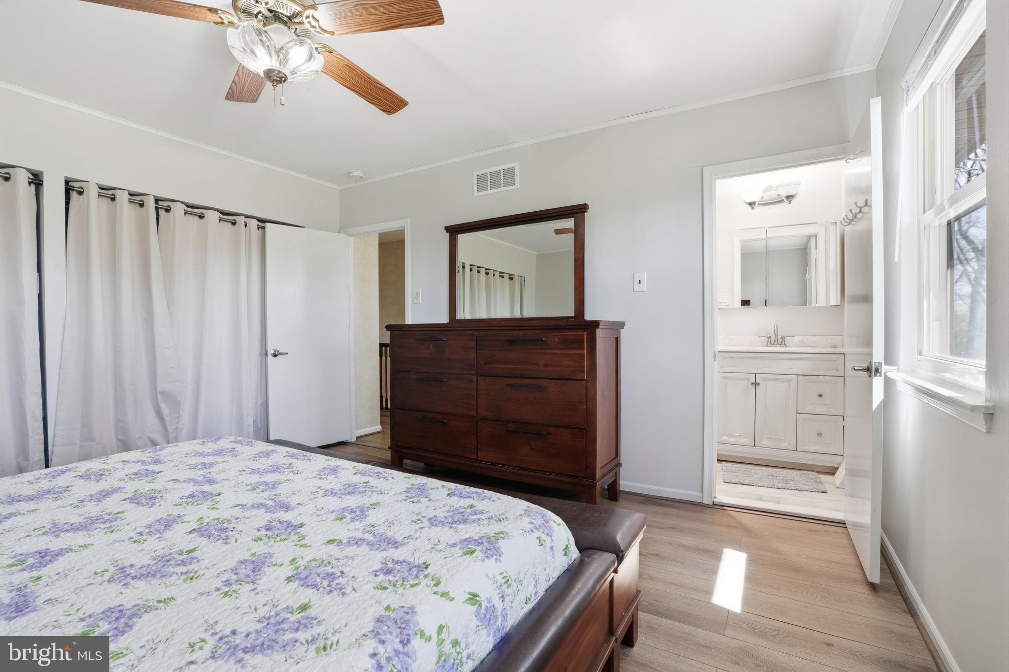 739 Bridgeview Road Feasterville-Trevose, PA 19053 - Photo 24 of 46 a bedroom with a bed and a mirror on the dresser