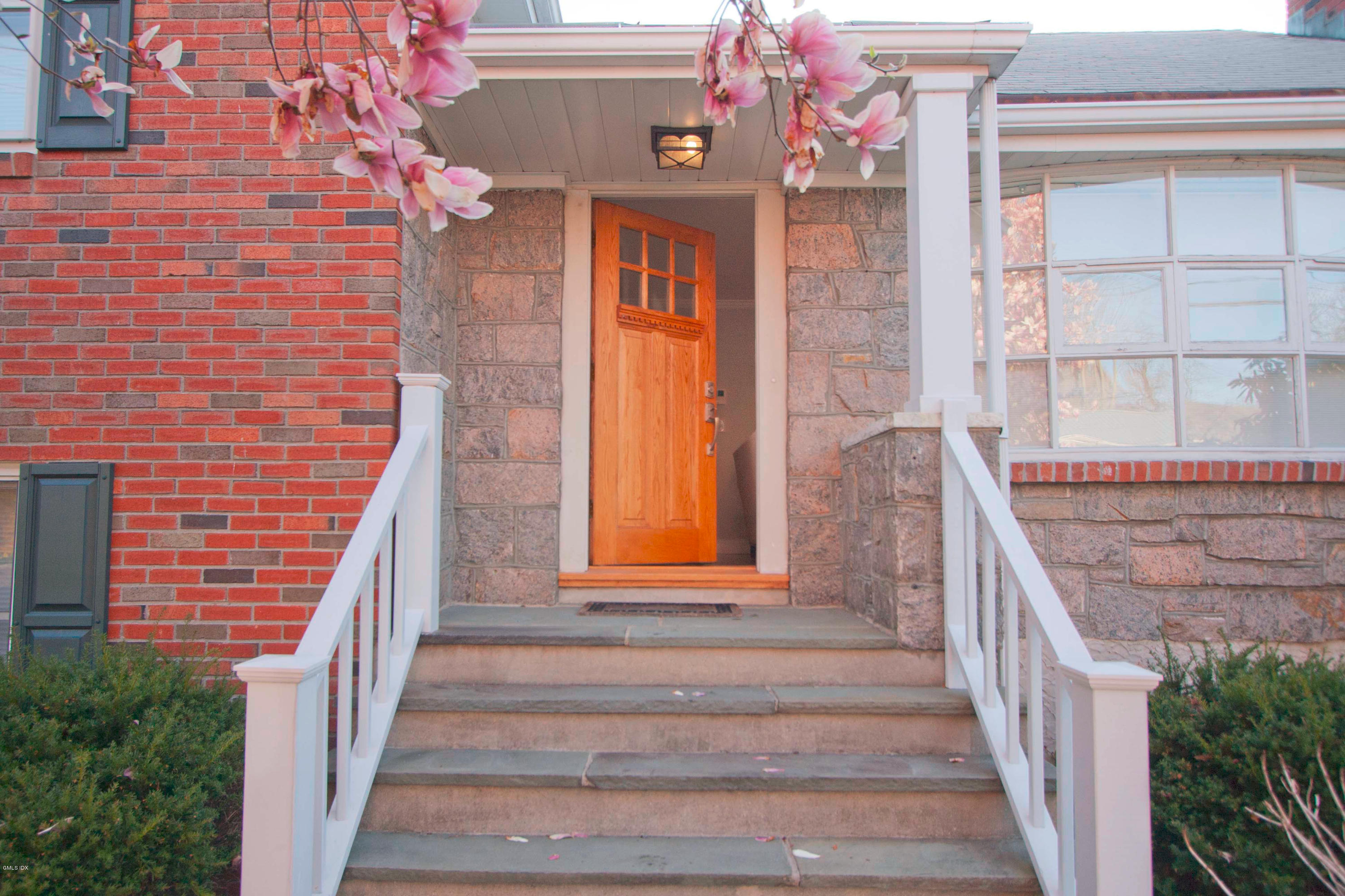 41 Indian Field Road Greenwich, CT 06830 - Photo 2 of 20 a front view of a house with a window
