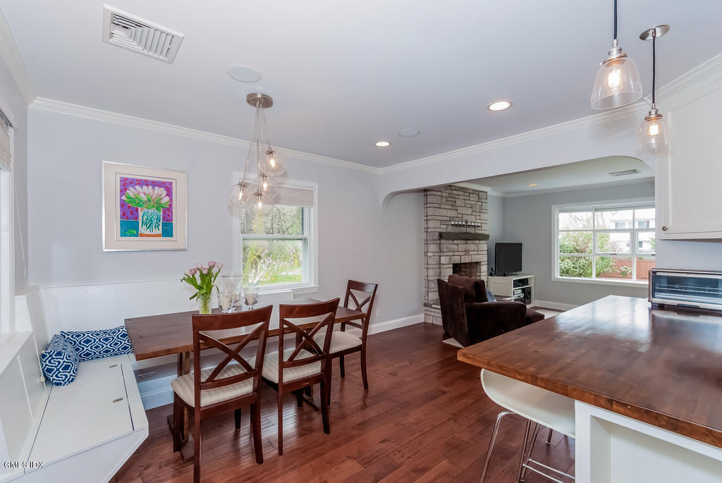 41 Indian Field Road Greenwich, CT 06830 - Photo 8 of 20 a view of a dining room with furniture window and wooden floor