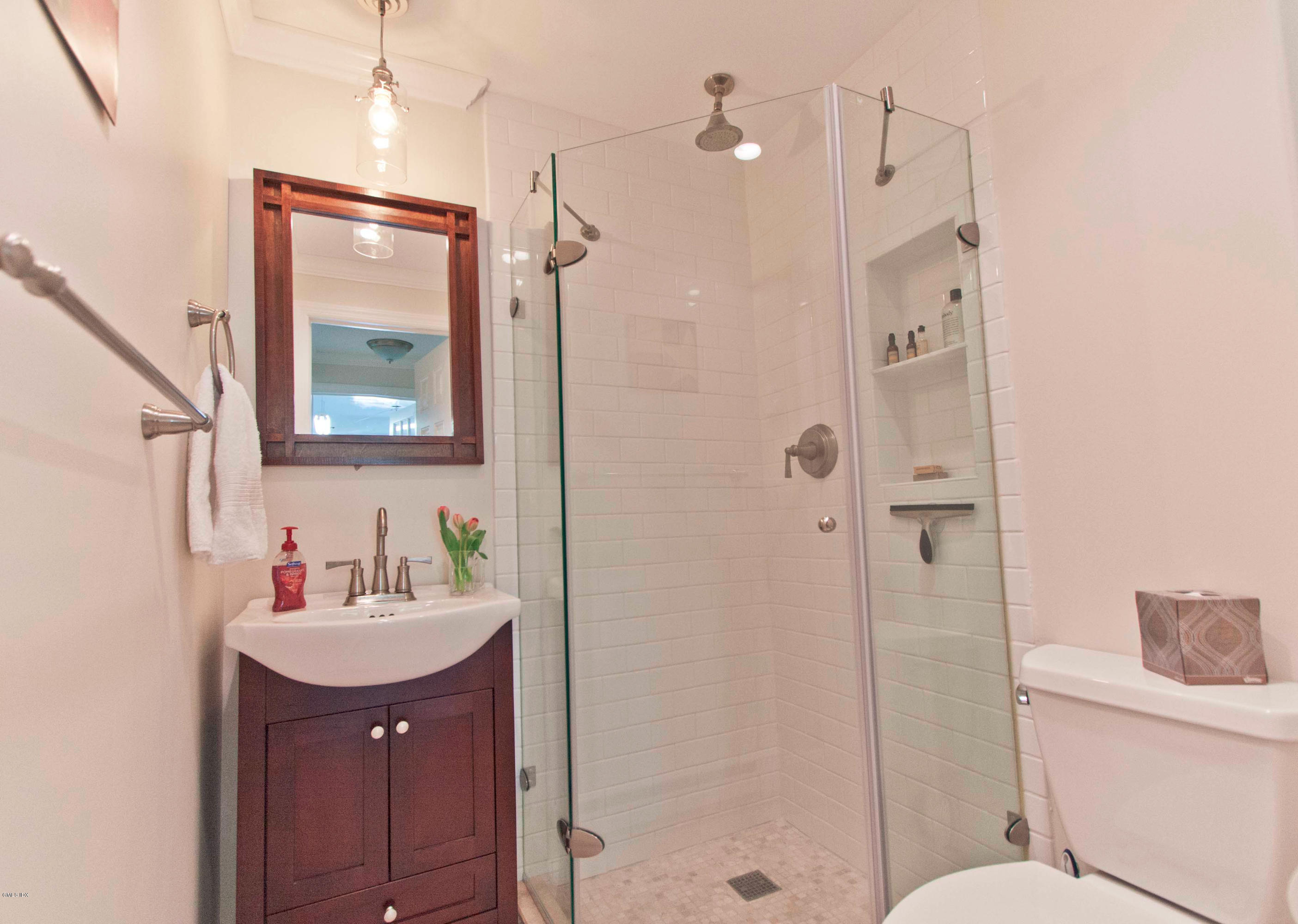 41 Indian Field Road Greenwich, CT 06830 - Photo 10 of 20 a bathroom with a sink toilet and shower