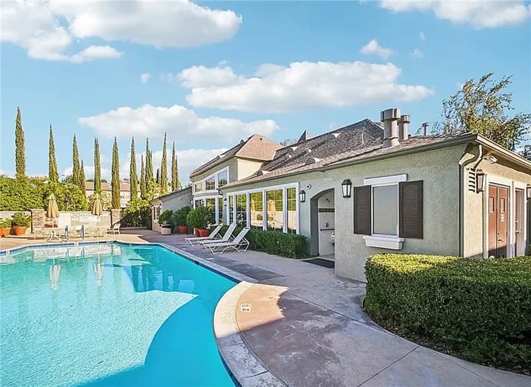 20000 Plum Canyon Road, Unit 225 Saugus, CA 91350 - Photo 12 of 12 a view of a house with swimming pool and sitting area