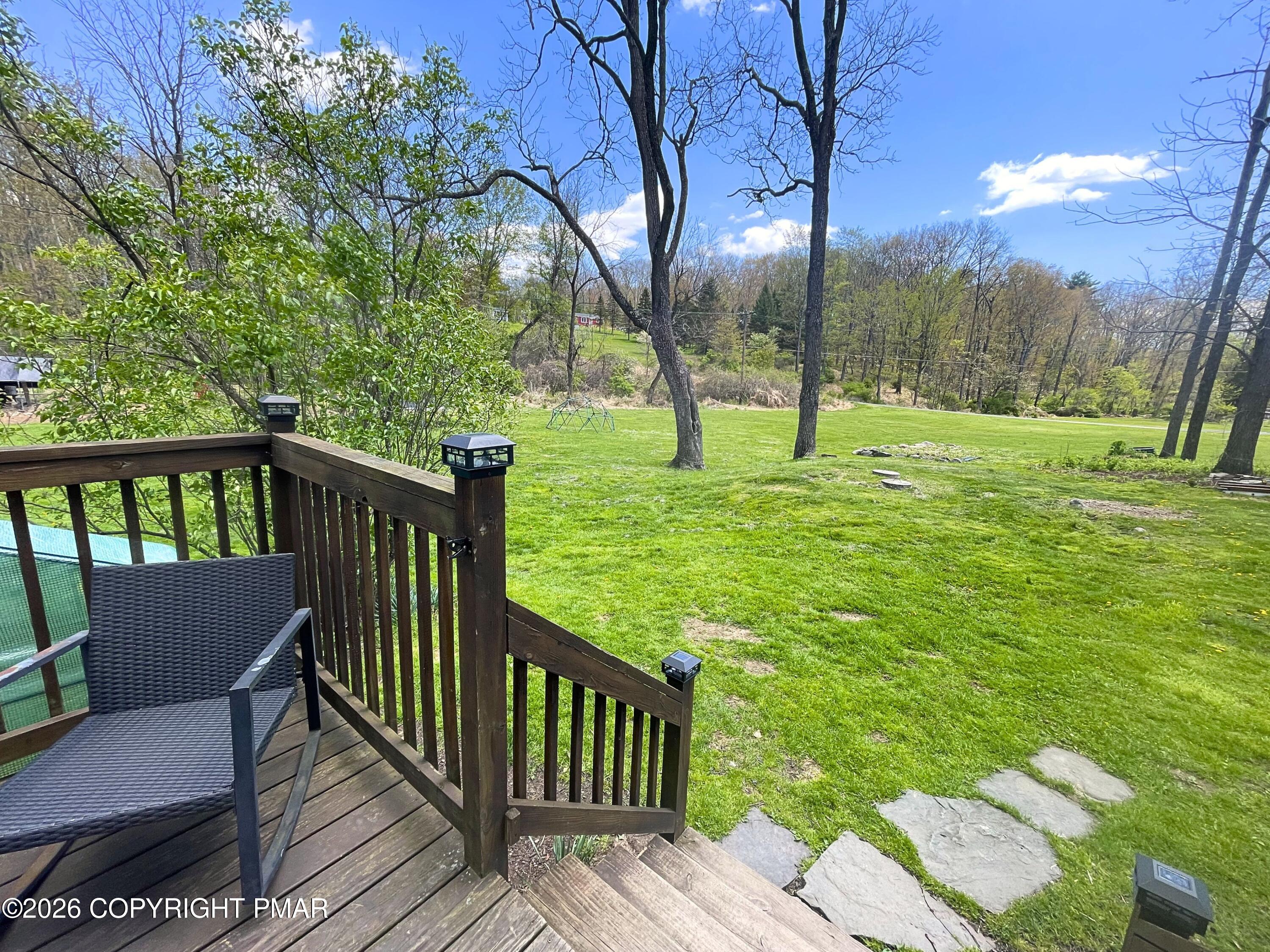 5780 Paradise Valley Road Cresco, PA 18326 - Photo 22 of 29 Deck to yard