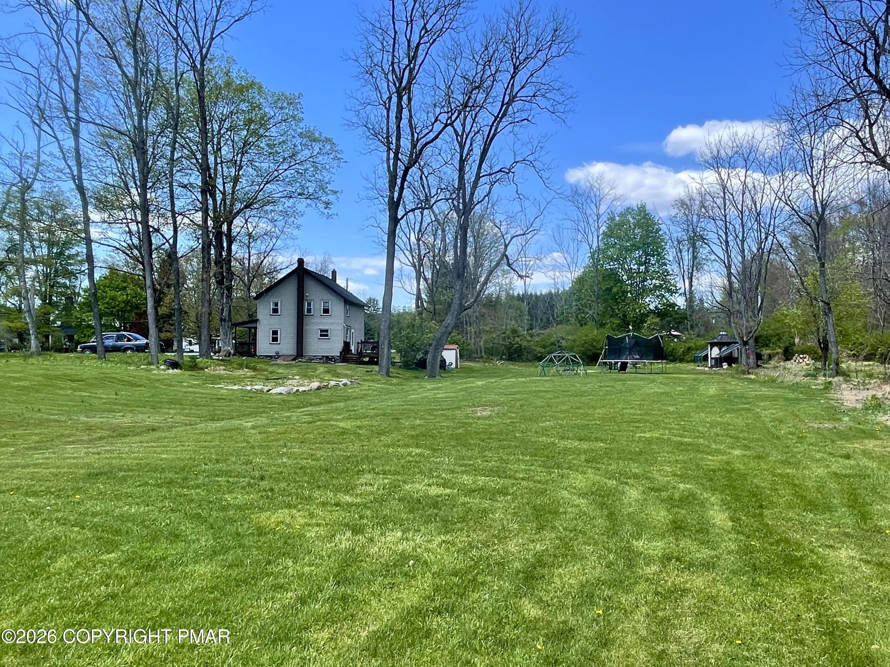 5780 Paradise Valley Road Cresco, PA 18326 - Photo 24 of 29 side yard