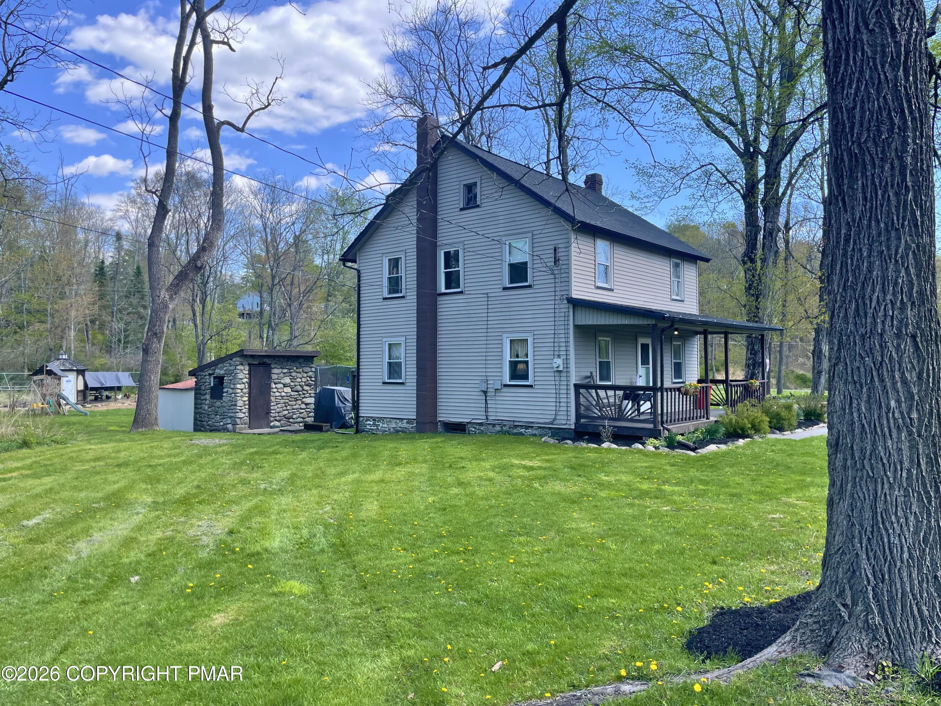 5780 Paradise Valley Road Cresco, PA 18326 - Photo 29 of 29 side ex with stone hsed