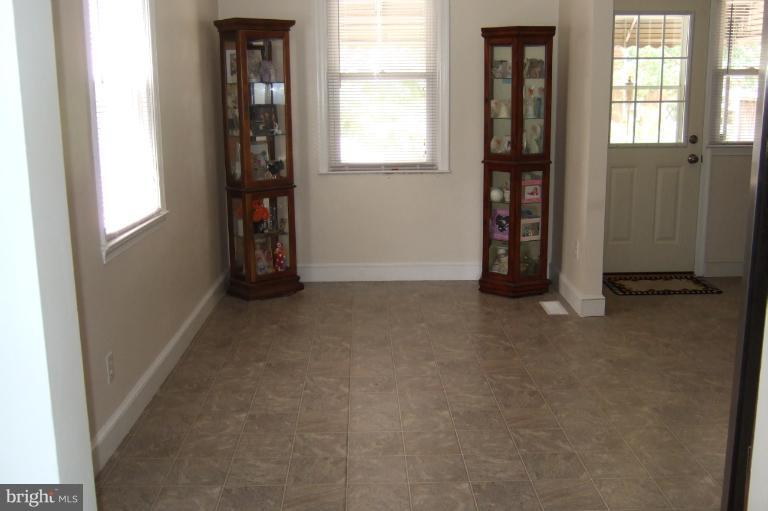 560 Welbrook Road Essex, MD 21221 - Photo 1 of 14 Table area with lots of natural light