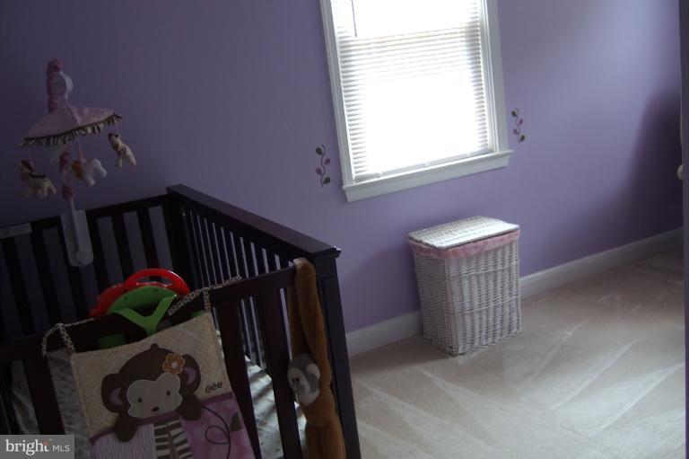 560 Welbrook Road Essex, MD 21221 - Photo 3 of 14 One of three second floor bedrooms