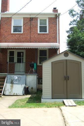 560 Welbrook Road Essex, MD 21221 - Photo 4 of 14 Neat and clean backyard with storage shed