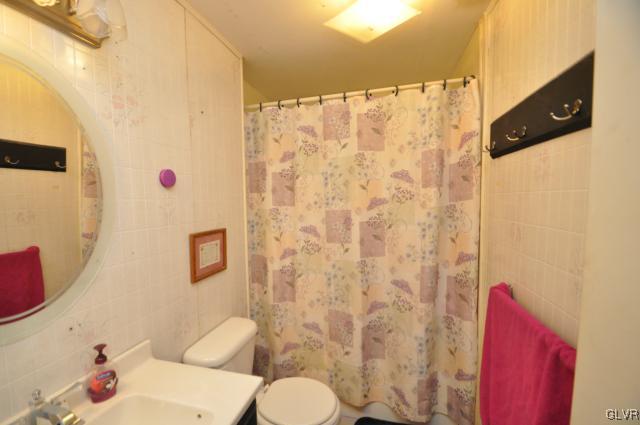 417 North Penn Dixie Road Bath, PA 18014 - Photo 14 of 25 a bathroom with a sink toilet and shower