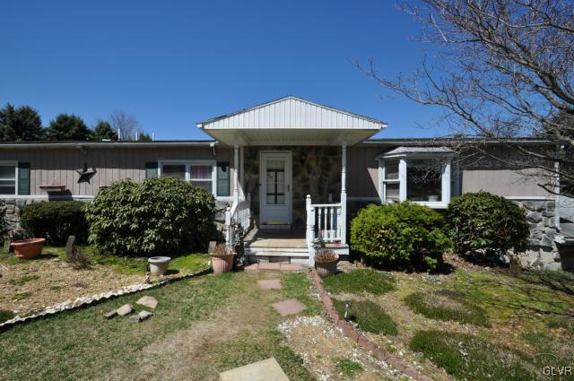 417 North Penn Dixie Road Bath, PA 18014 - Photo 3 of 25 a front view of a house with garden