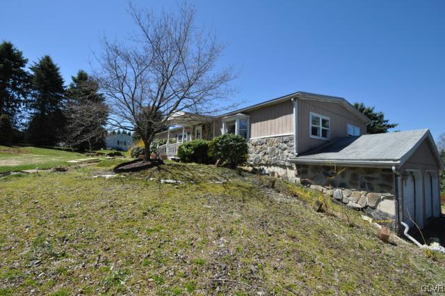 417 North Penn Dixie Road Bath, PA 18014 - Photo 4 of 25 a front view of a house with a yard