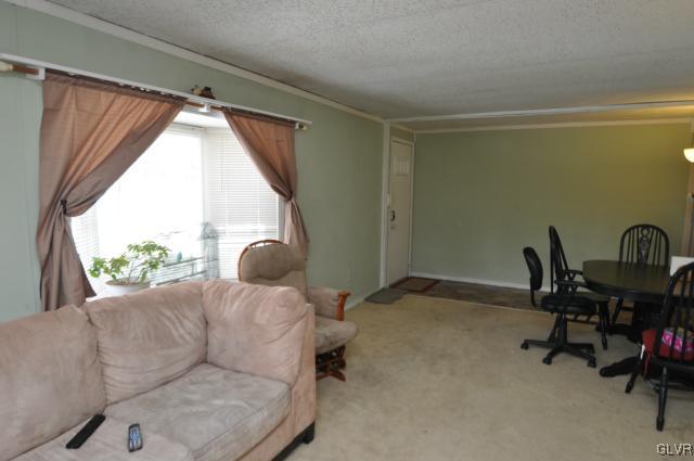 417 North Penn Dixie Road Bath, PA 18014 - Photo 7 of 25 a living room with furniture and a window
