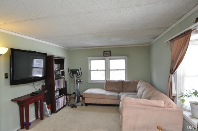 417 North Penn Dixie Road Bath, PA 18014 - Photo 8 of 25 a living room with furniture and a flat screen tv