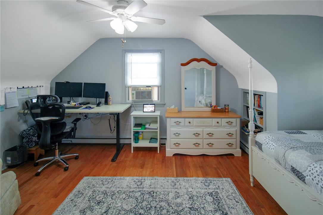 1256 Ridge Avenue Whitehall, PA 18052 - Photo 32 of 43 Hardwood floors and a ceiling fan highlight this adaptable bedroom space.
