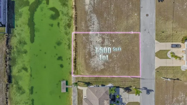 a view of a bathroom with shower and mirror