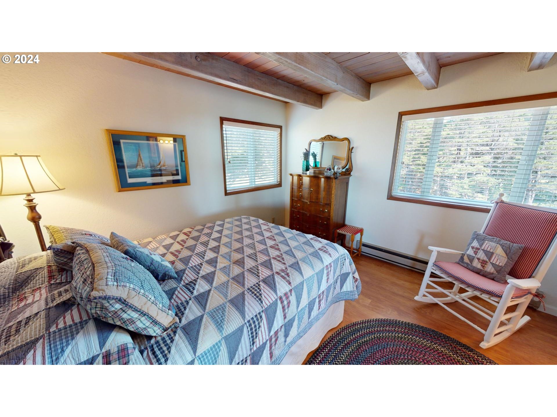 42512 Gull Road Port Orford, OR 97465 - Photo 20 of 41 a bedroom with a bed window and couch