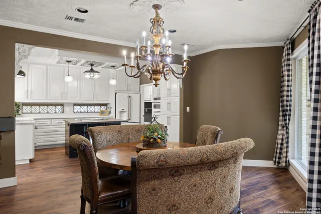 a kitchen with a stove and a sink