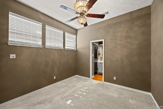 a bathroom with a sink vanity and a mirror