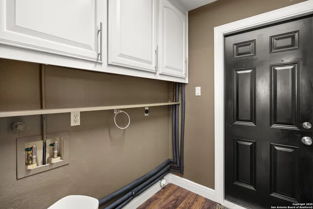 a view of a dinning tables and chairs in patio of the house