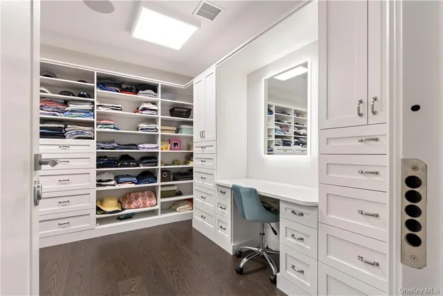 a view of an empty walk in closet