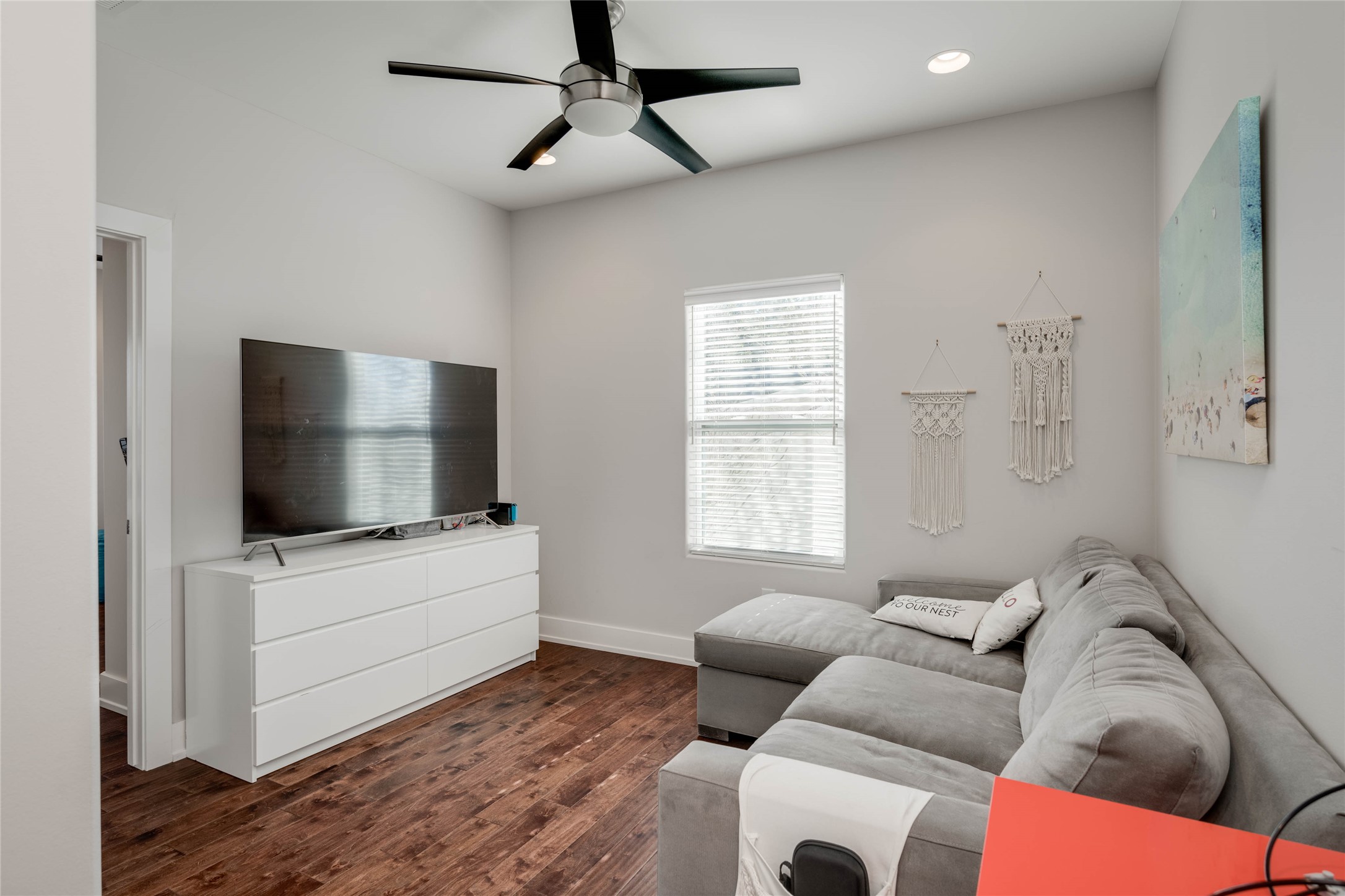 7514 Hardy Drive Austin, TX 78757 - Photo 12 of 29 Living room featuring ceiling fan, dark wood-style floors, and recessed lighting