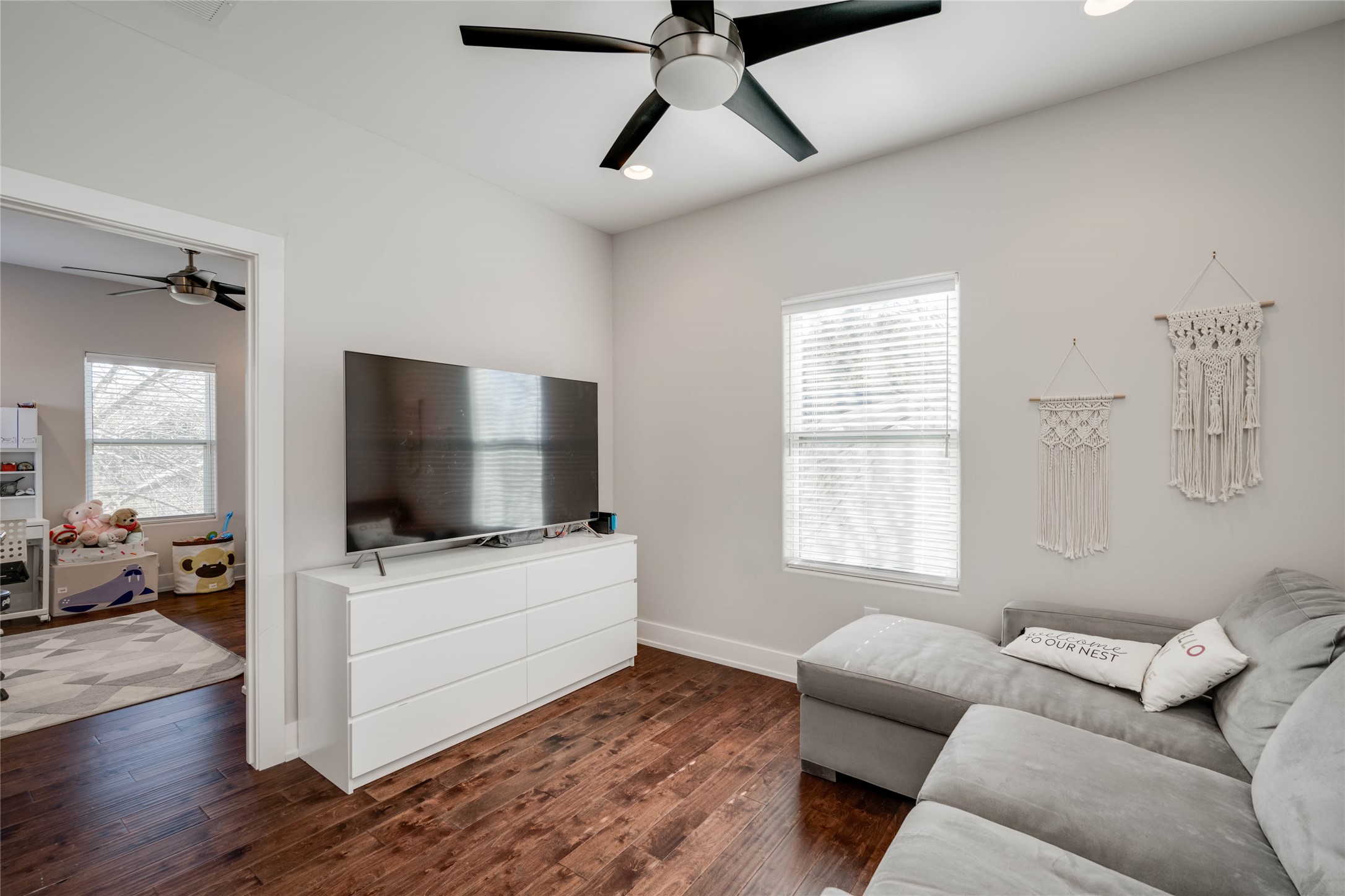 7514 Hardy Drive Austin, TX 78757 - Photo 13 of 29 Living area with ceiling fan, dark wood-type flooring, and recessed lighting