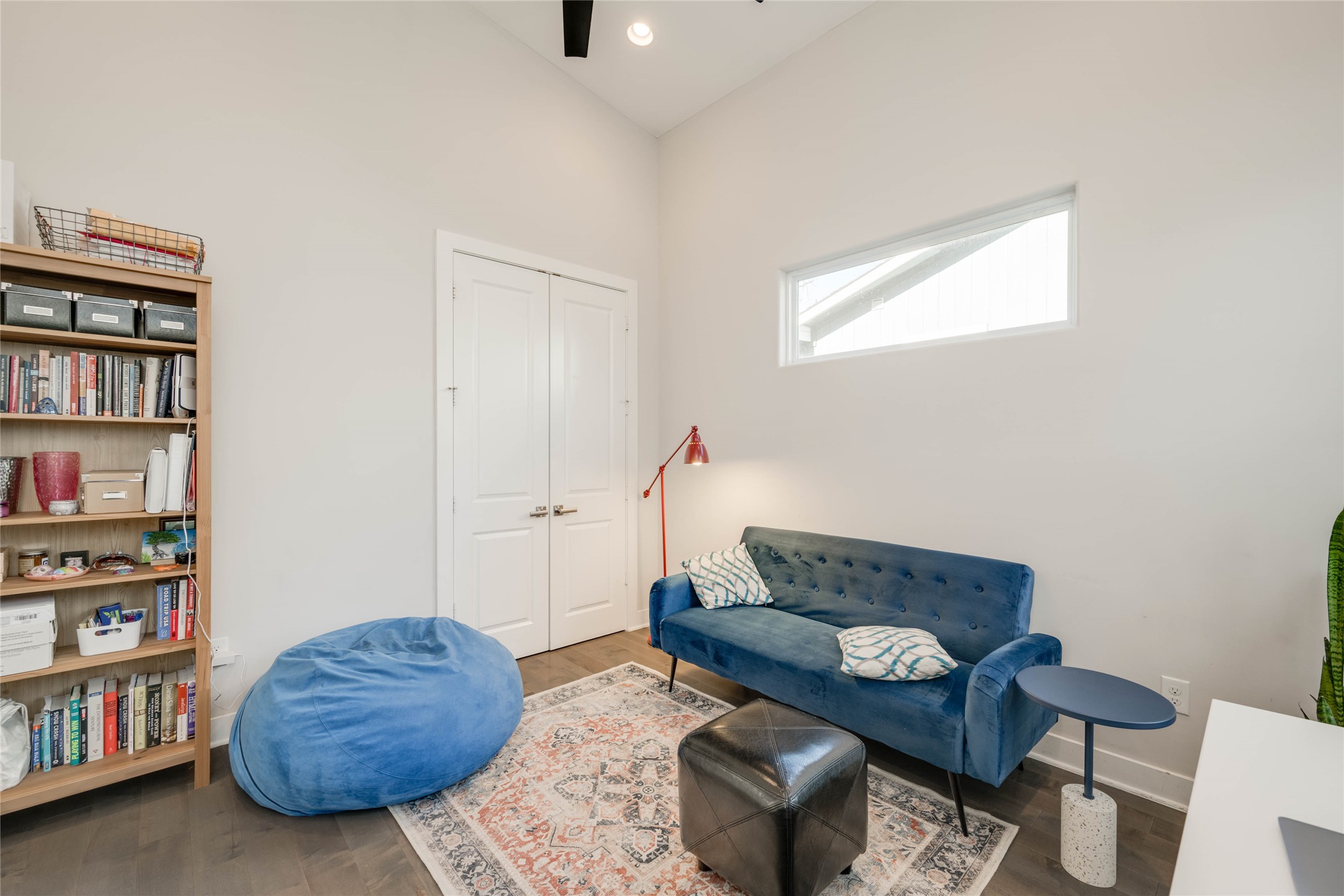 7514 Hardy Drive Austin, TX 78757 - Photo 18 of 29 Living area with wood finished floors, lofted ceiling, recessed lighting, and a ceiling fan