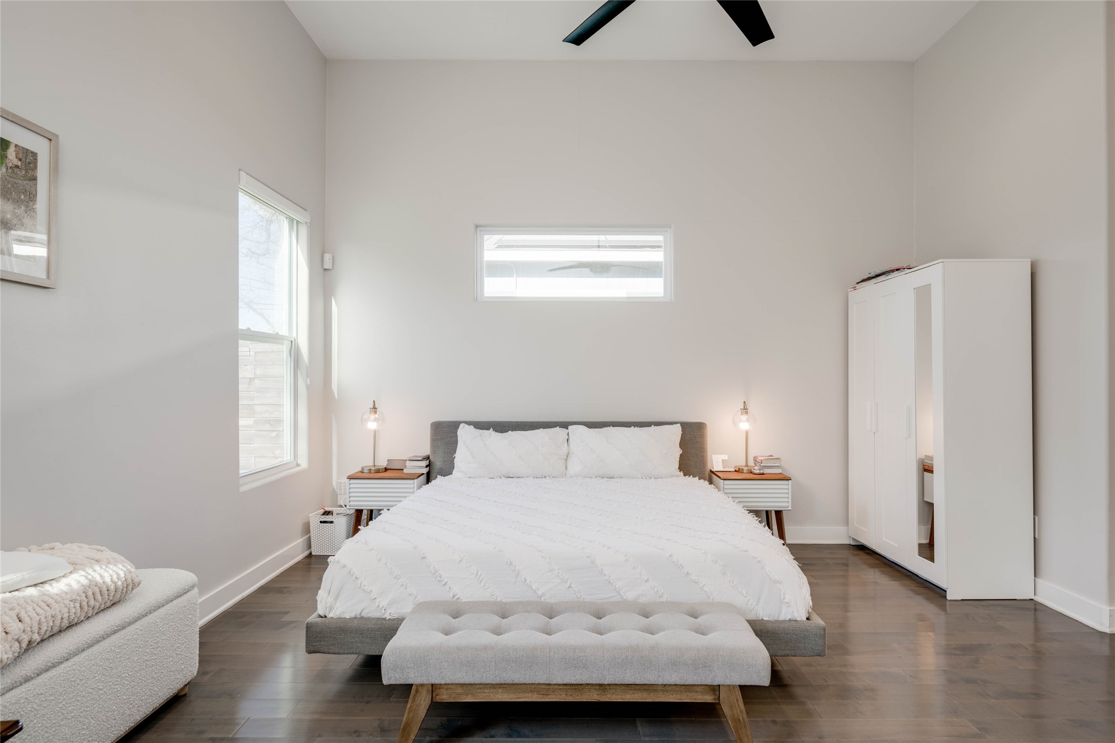 7514 Hardy Drive Austin, TX 78757 - Photo 21 of 29 Bedroom featuring dark wood-style floors and a ceiling fan