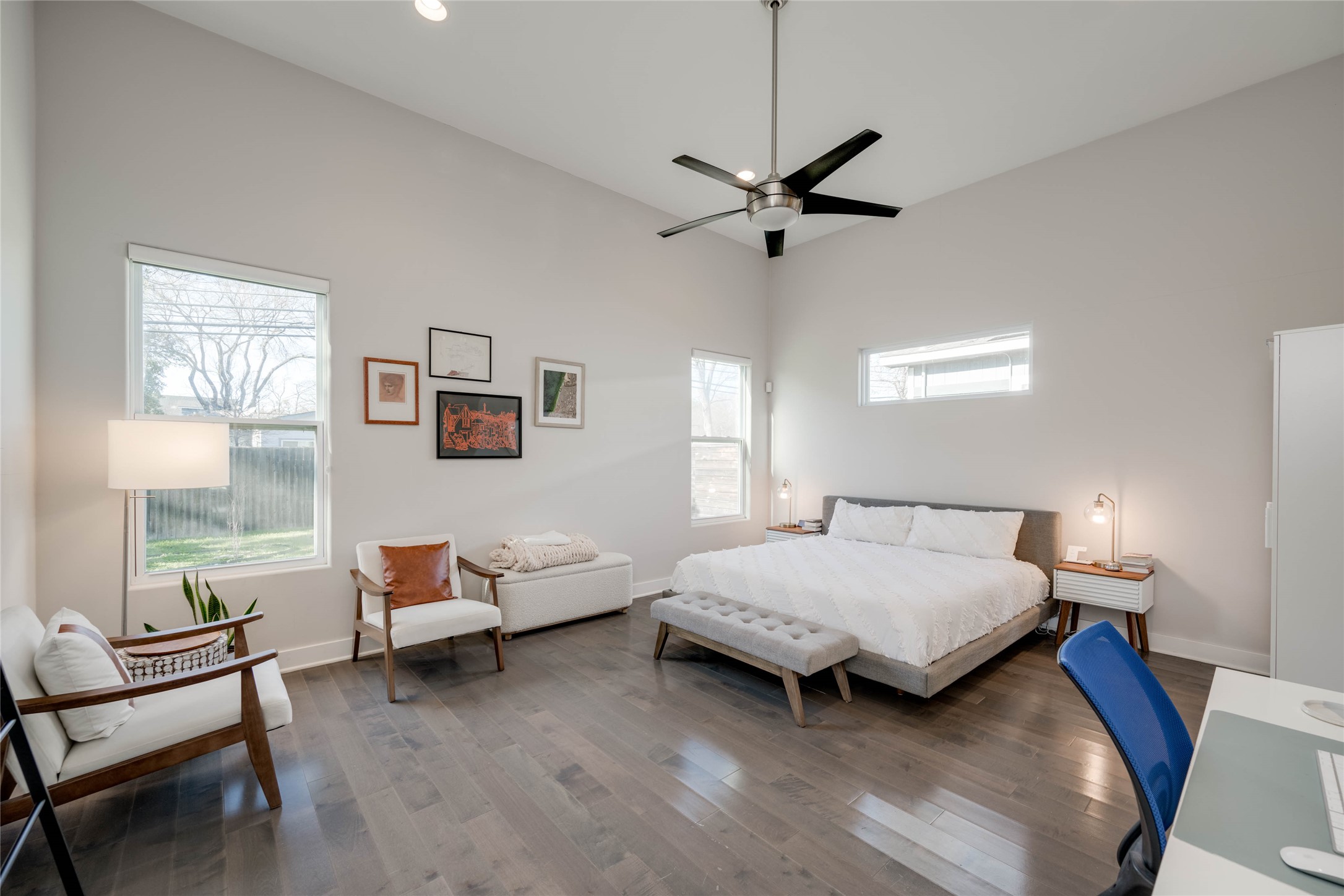 7514 Hardy Drive Austin, TX 78757 - Photo 23 of 29 Bedroom featuring hardwood / wood-style floors and a ceiling fan