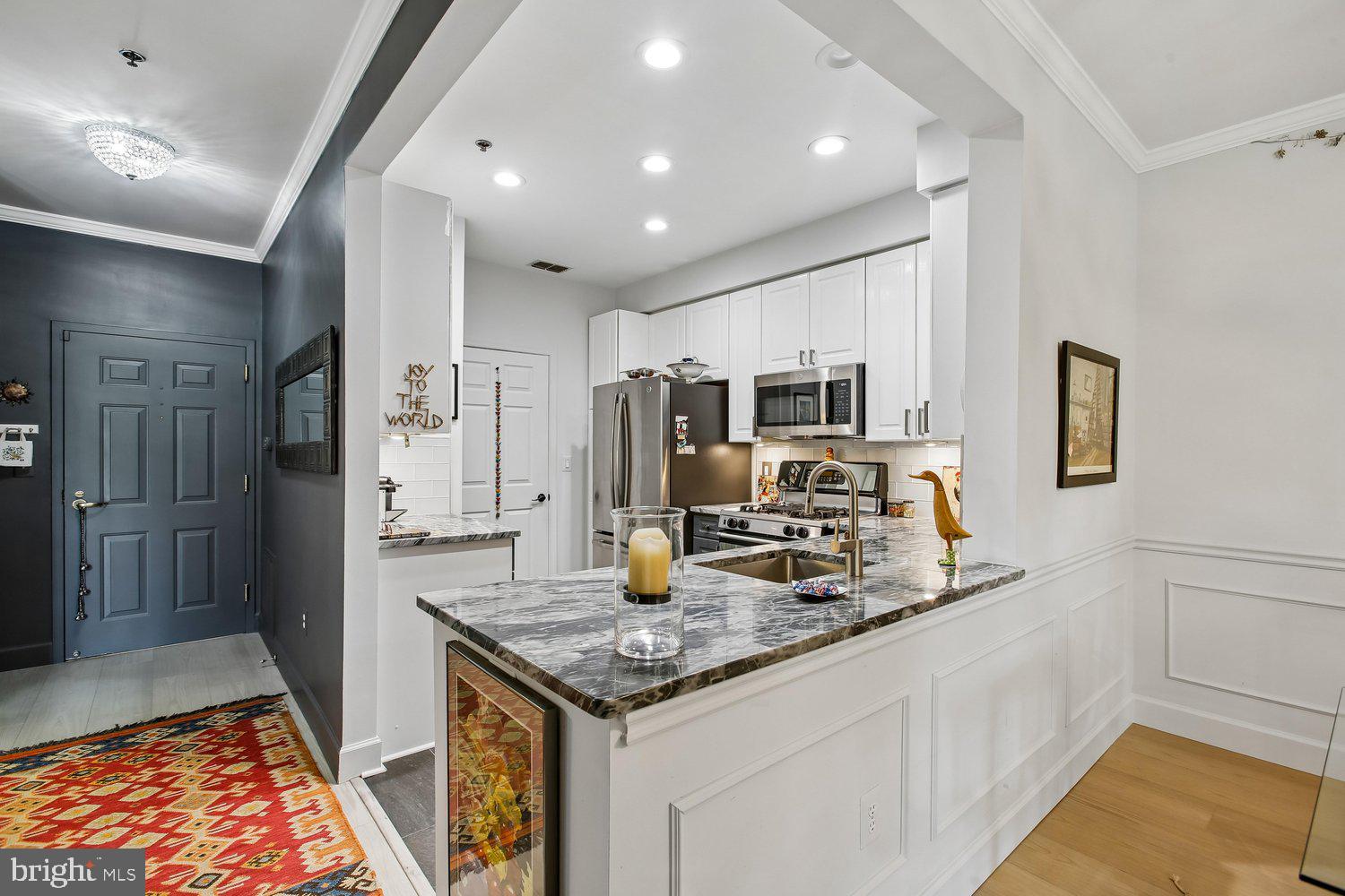 1855 Stratford Park Place, Unit 103 Reston, VA 20190 - Photo 8 of 49 Open Kitchen.
