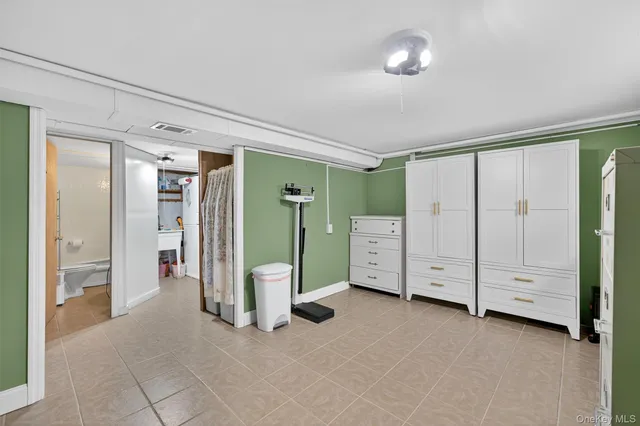 a view of a bedroom with closet