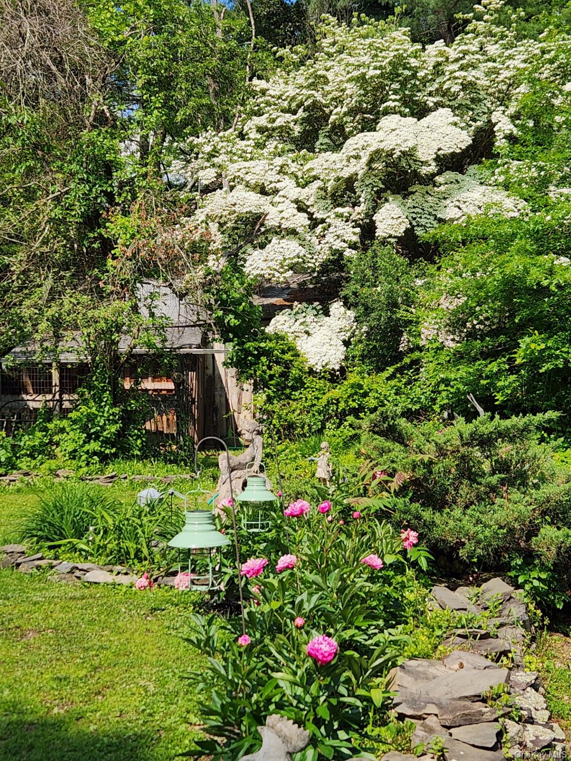 93 Widmer Road Wappingers Falls, NY 12590 - Photo 40 of 45 View of yard, flowering perennials.
