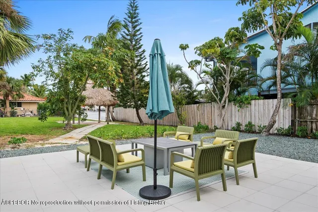 a view of an outdoor sitting area with chairs