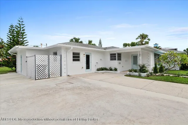 front view of a house with a street