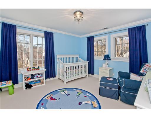 9 Stanley Road Darien, CT 06820 - Photo 12 of 20 a living room with furniture and two windows