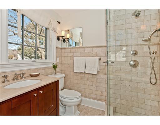 9 Stanley Road Darien, CT 06820 - Photo 13 of 20 a bathroom with a sink a toilet and shower