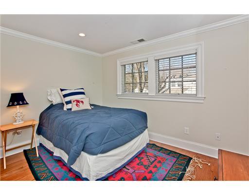 9 Stanley Road Darien, CT 06820 - Photo 14 of 20 a bedroom with a bed and a window