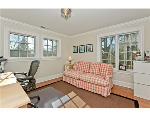 9 Stanley Road Darien, CT 06820 - Photo 15 of 20 a living room with a couch next to a window
